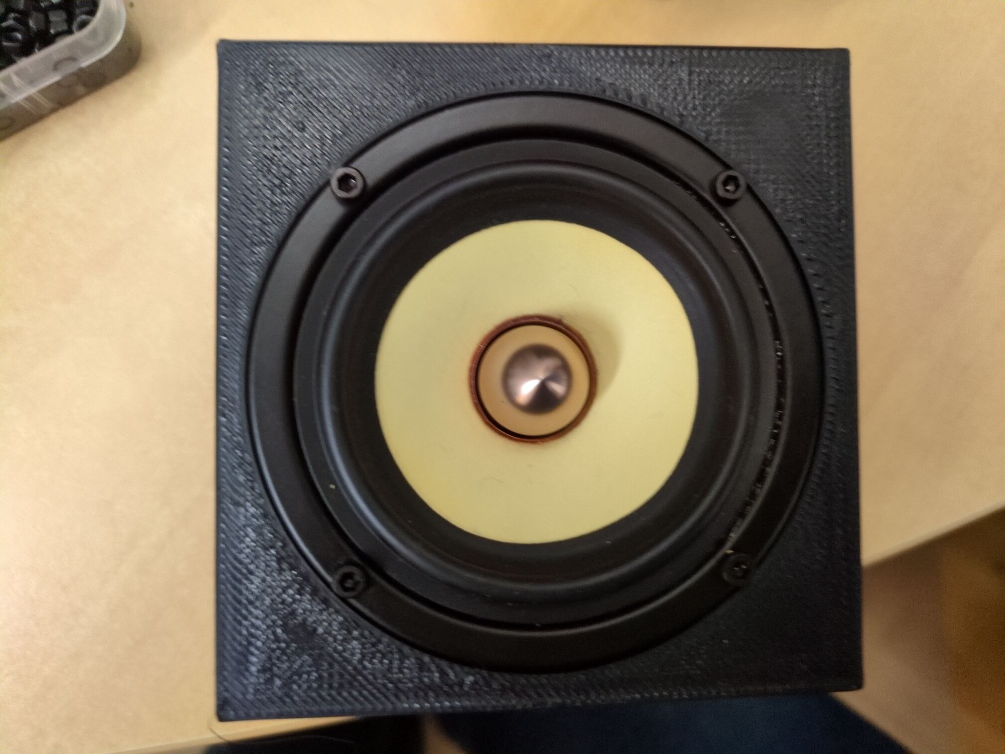 Hastily printed square with the driver in the center (overextruded as hell but it fits c:)